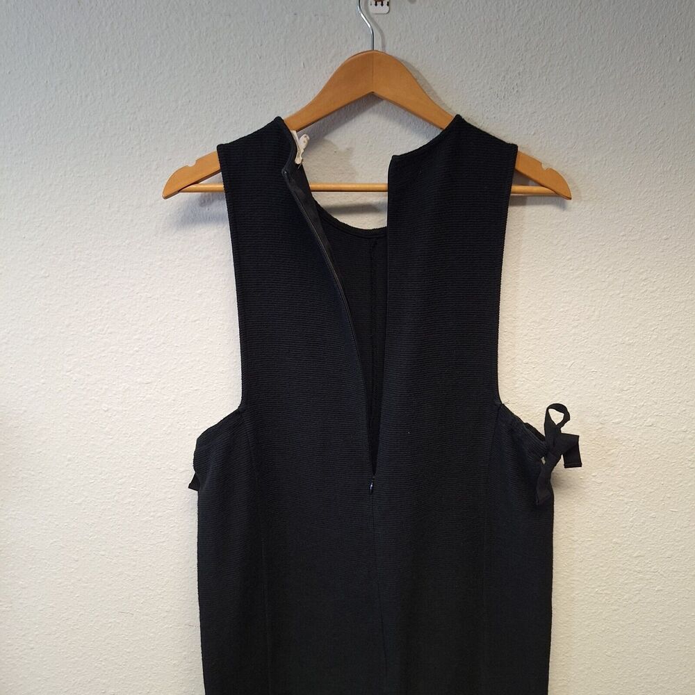 Black Sleeveless Wide-Leg Jumpsuit with Side Tie Detail - Picture 6 of 12